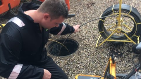 Drainclear engineer unblocking drain in Leicester
