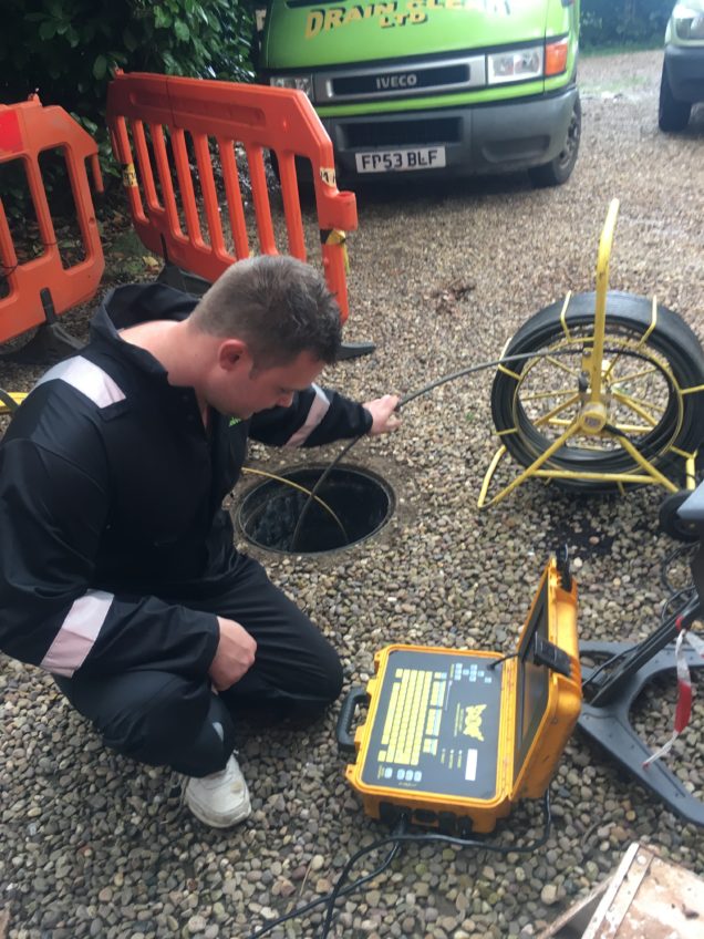 Drainclear engineer unblocking drain in Leicester